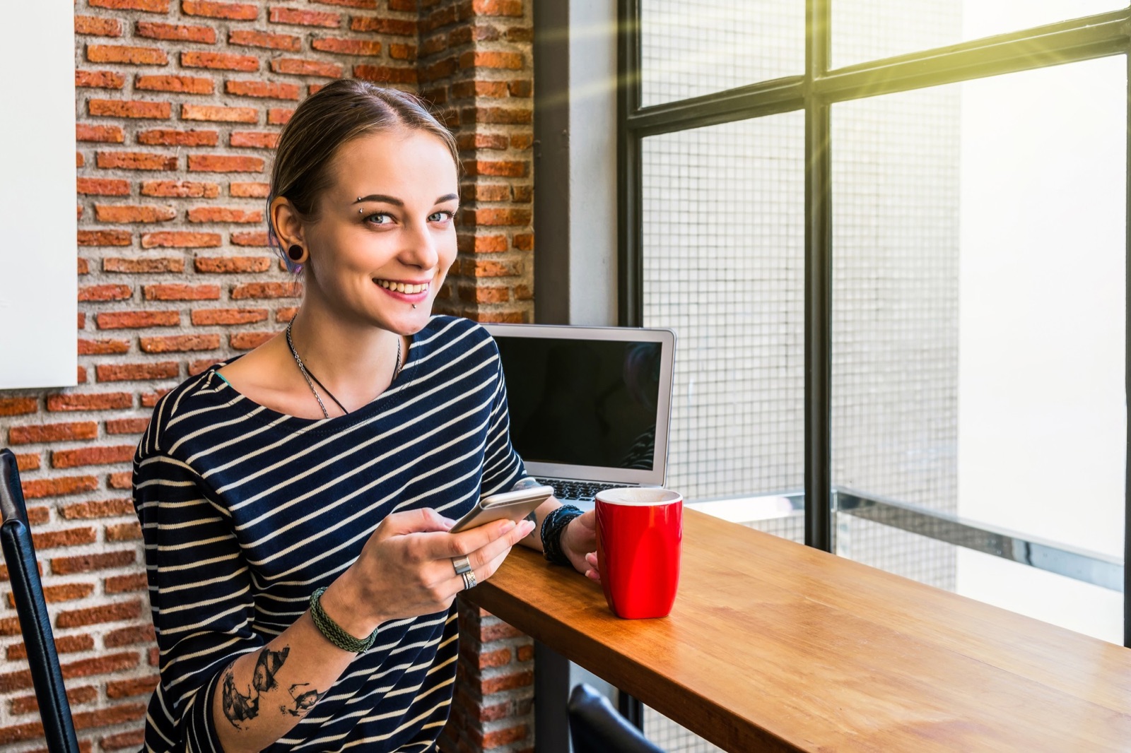 women in front of a laptop
